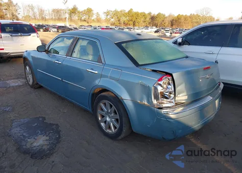 2009 Chrysler 300 Limited z USA, uszkodzony, nr VIN 2C3KA33V69H543994